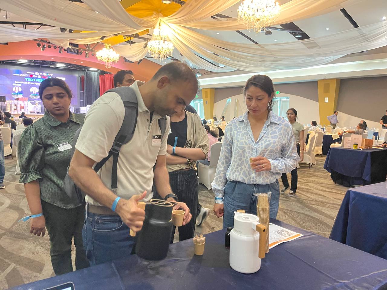 Attendees tasting ceremonial cacao at TECH FEST 2026